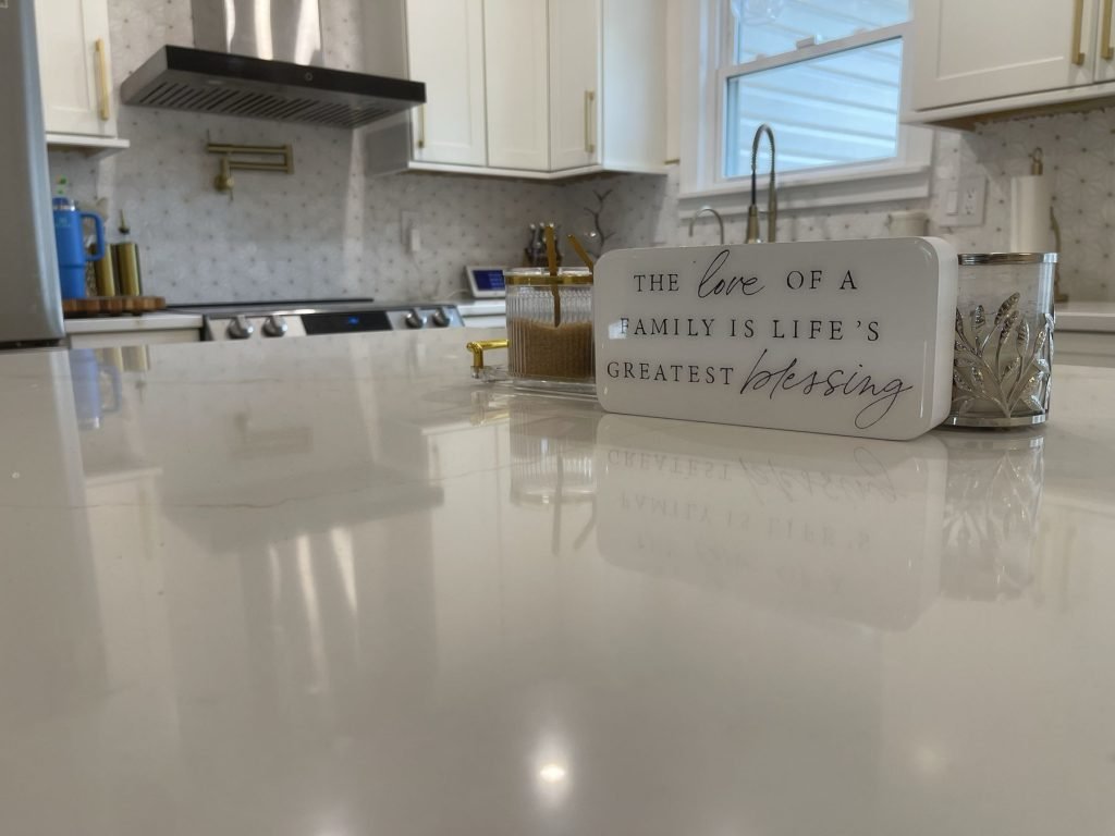 Polished quartz countertop in a remodeled kitchen