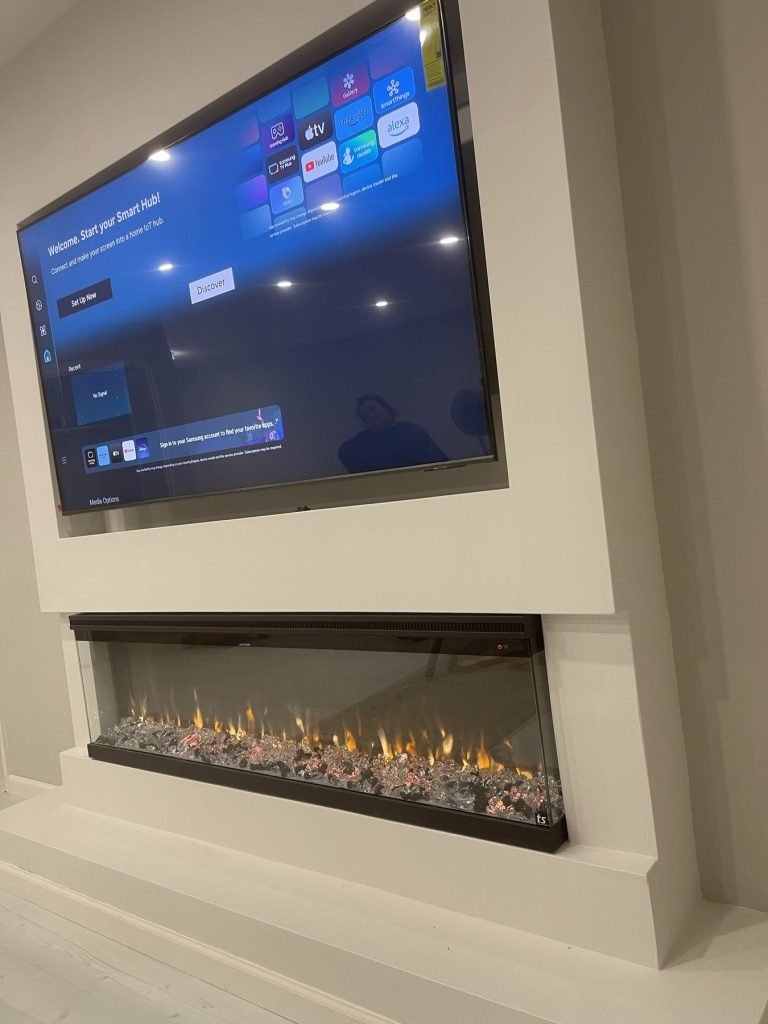 Floating media wall with recessed TV and linear electric fireplace