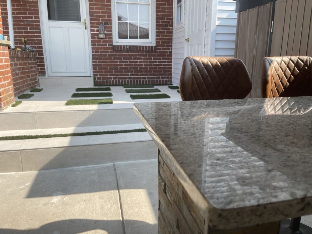 Outdoor patio bar with granite top and stacked stone base