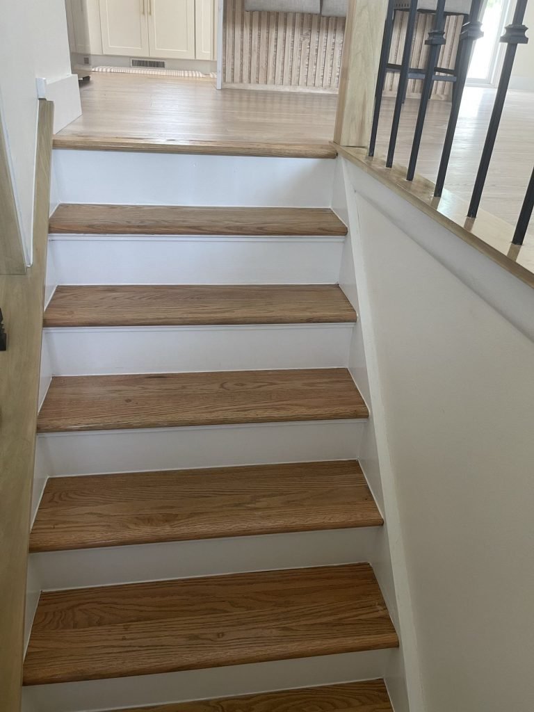 New oak stair treads with white risers